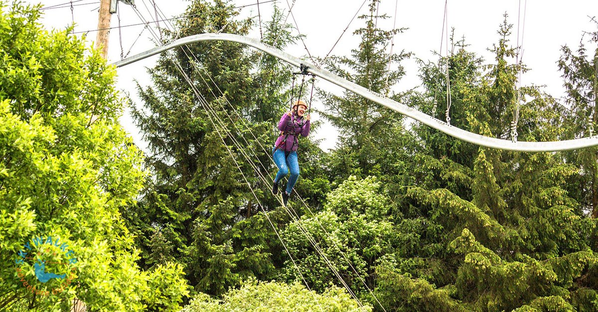 The ZipCoaster Fly through the air dipping and twisting at an